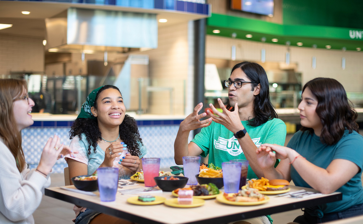 A group of diners eating and talking at Eagle Landing