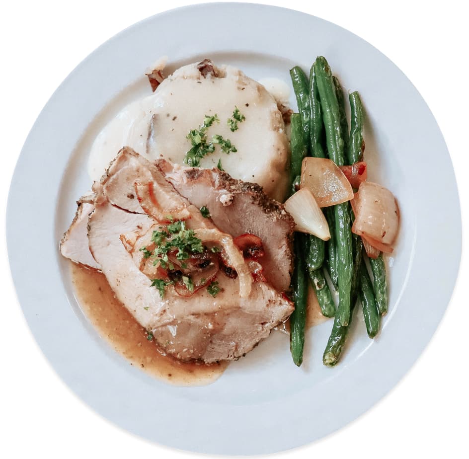 A plate of chicken and beans at kitchen west